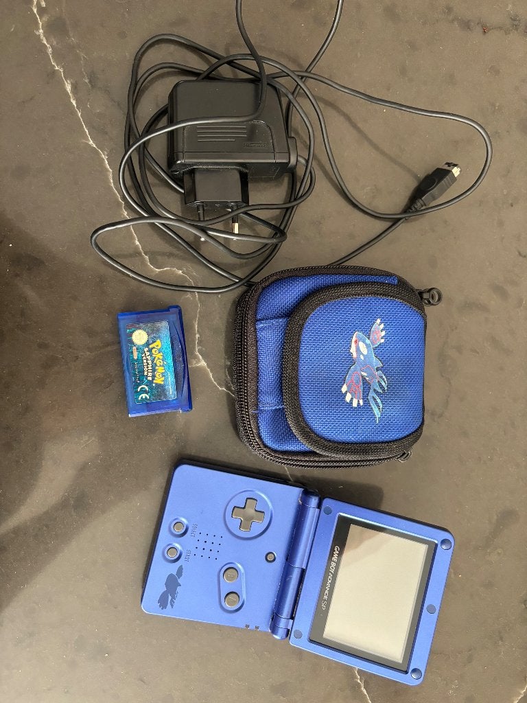 Game Boy Advance SP – Pokémon Kyogre blauw +Pokémon Sapphire, 1 speler, Ophalen of Verzenden, Zo goed als nieuw, Role Playing Game (Rpg)
