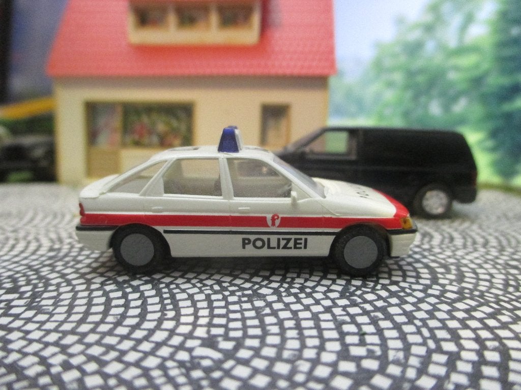 Ford Escort Mk.5 - Praliné Politie Zwitserland, Ophalen of Verzenden, Zo goed als nieuw, Auto, Rietze