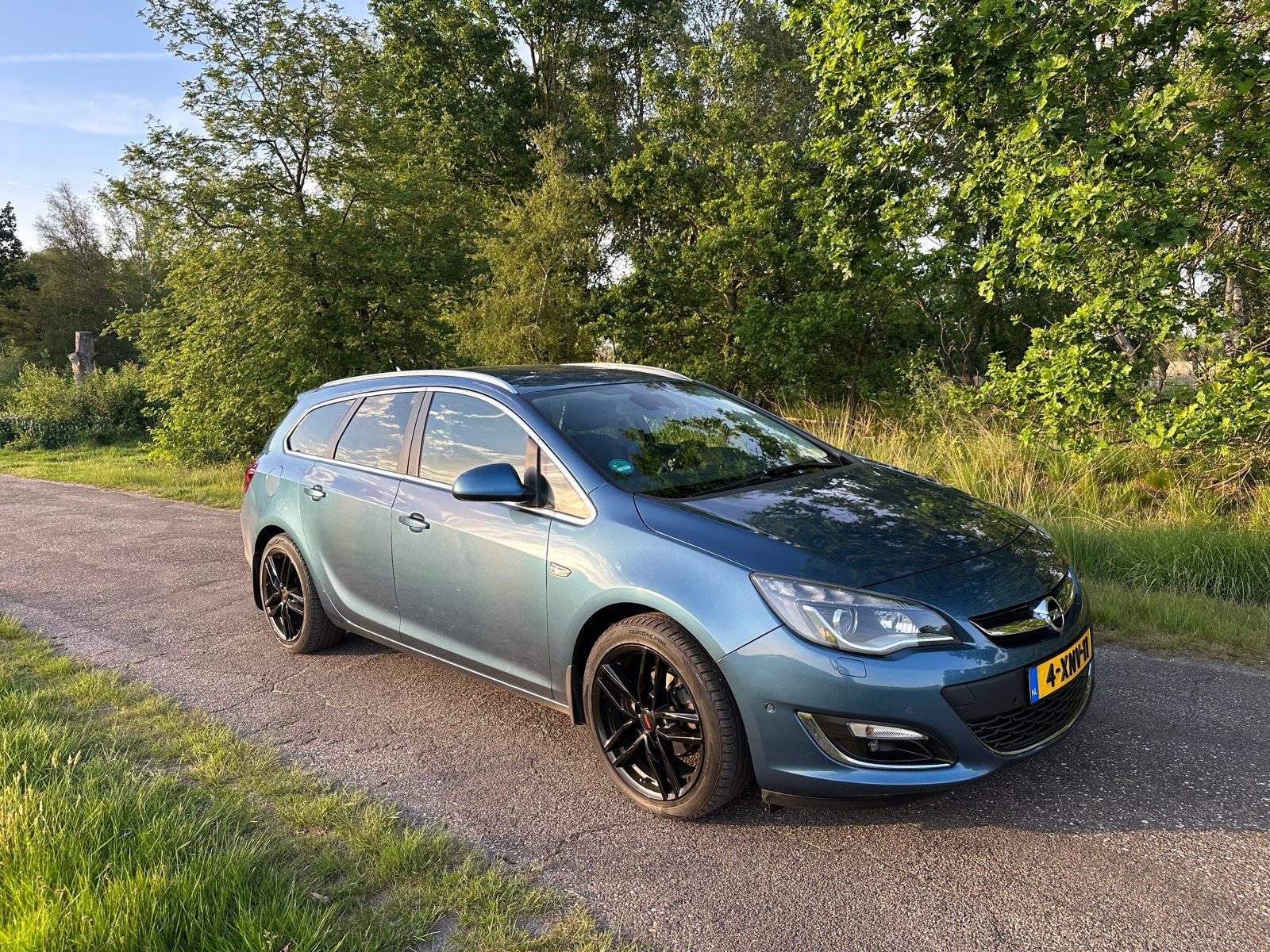 Opel Astra Sports Tourer 1.4 Turbo ST 2014 Blauw (NL), Voorwielaandrijving, Zwart, 4 cilinders, Handgeschakeld