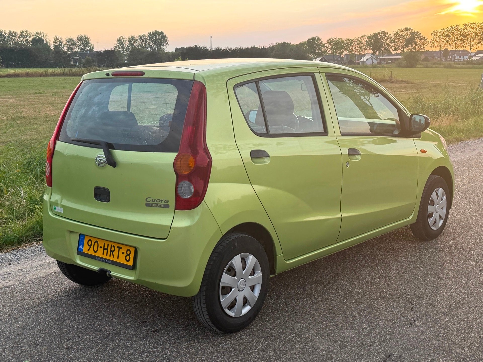 Daihatsu Cuore 1.0 Trend APK 02-2027 Airco NAP, Voorwielaandrijving, Stof, Zwart, 18 €/maand