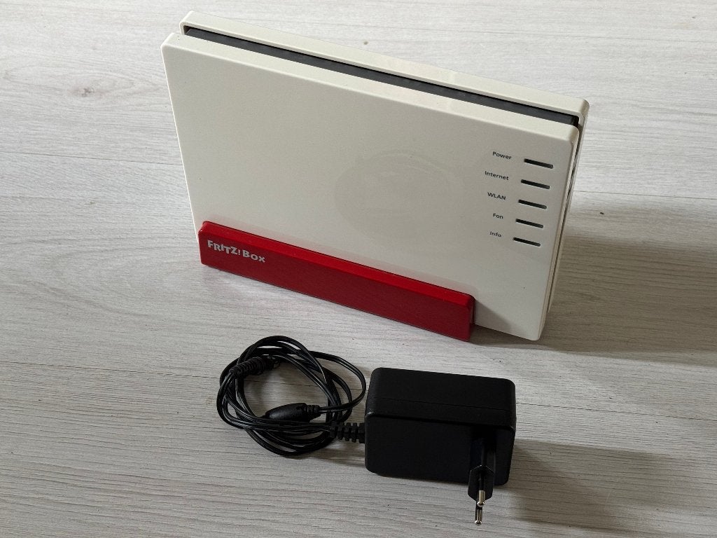 FRITZbox 7581 VDSL ADSL router modem met WiFi Mesh, Computers en Software, Ophalen of Verzenden, Zo goed als nieuw, Router met modem