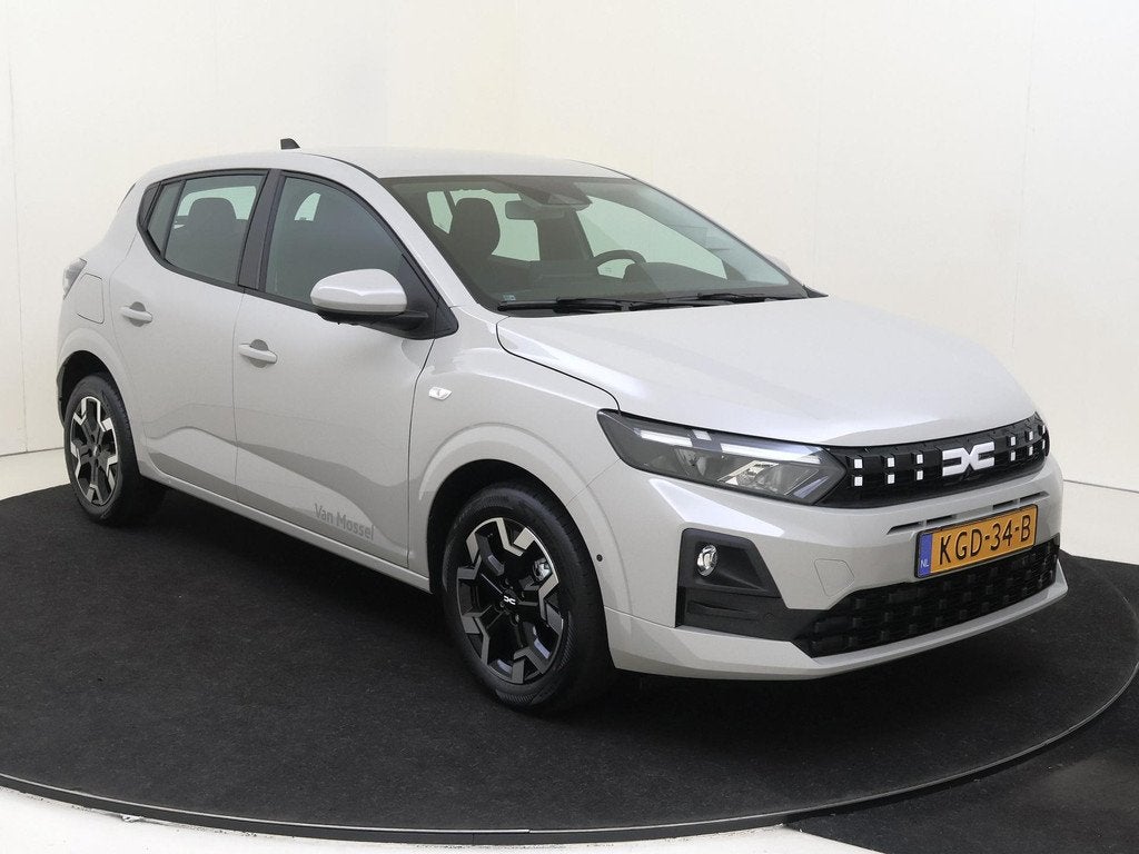 Dacia Sandero 1.2 Eco-G 120 journey | Stoelverwarming | Navi, Auto's, Stof, Euro 6, 1199 cc, Bruin