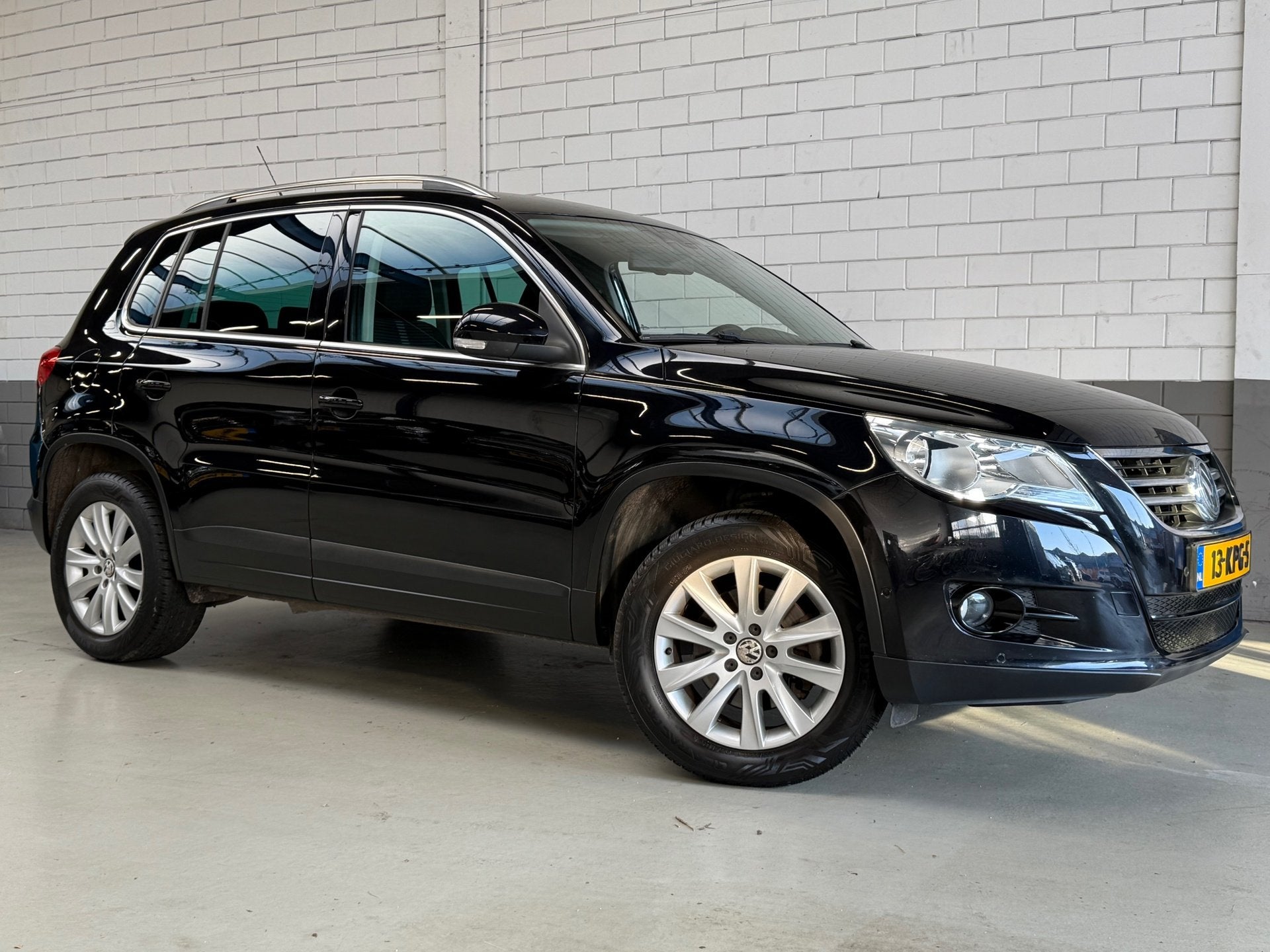 Volkswagen Tiguan 1.4 TSI Sport&Style, Auto's, Voorwielaandrijving, Euro 5, Zwart, 4 cilinders