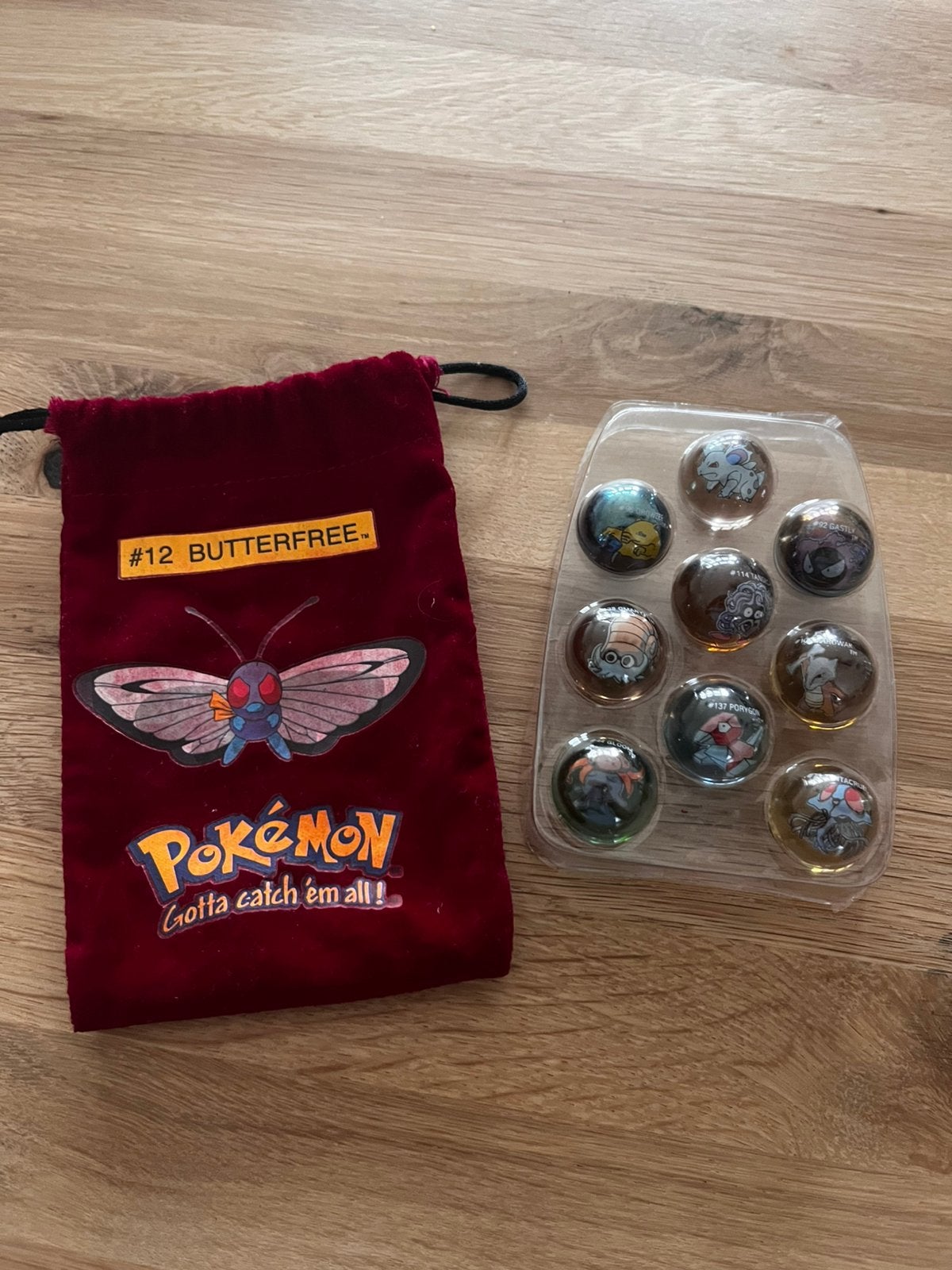 Vintage Pokémon verzameling – knikkers + Butterfree zakje, Ophalen of Verzenden, Nieuw, Overige typen