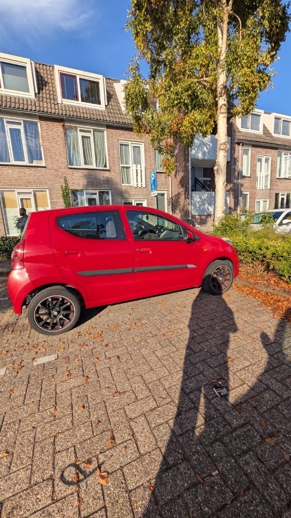 Suzuki Alto 1.0 2012 Rood, Auto's, Voorwielaandrijving, Stof, 200 kg, 4 stoelen