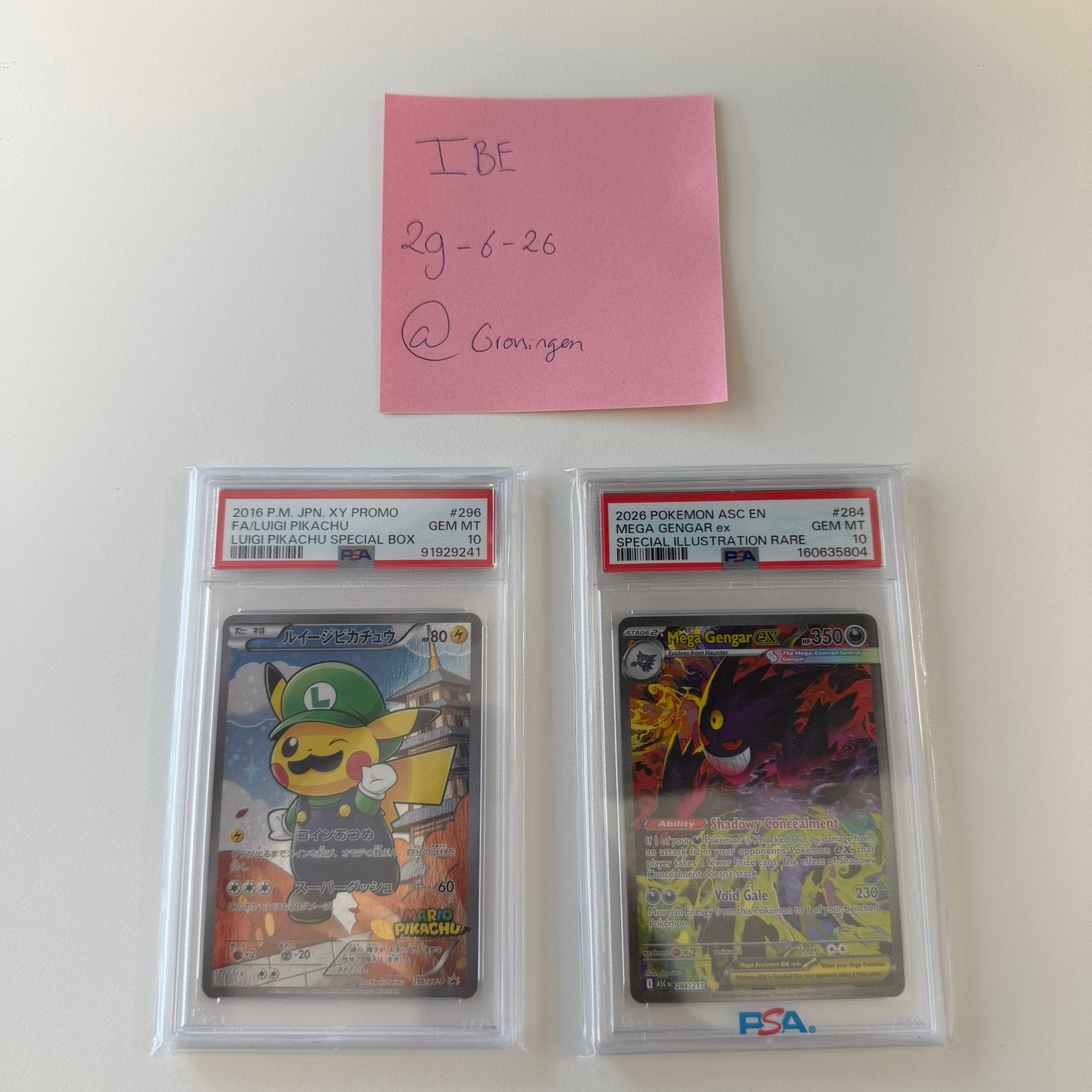 Luigi Pikachu 296 & Mega Gengar Ex 284 PSA 10, Ophalen of Verzenden, Zo goed als nieuw