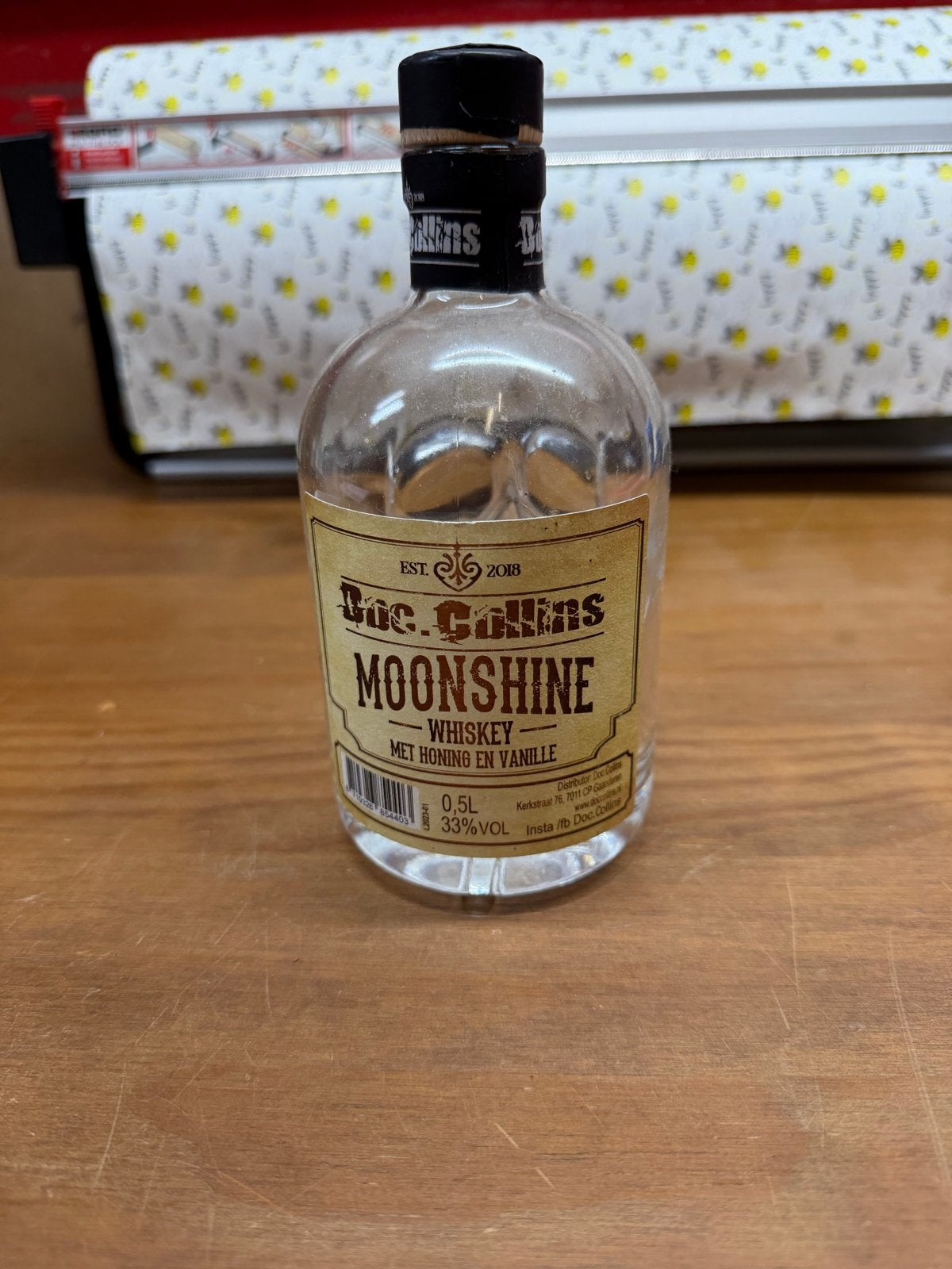 Lege Moonshine whiskyfles met honing - Doodshoofd design, Ophalen of Verzenden, Gebruikt