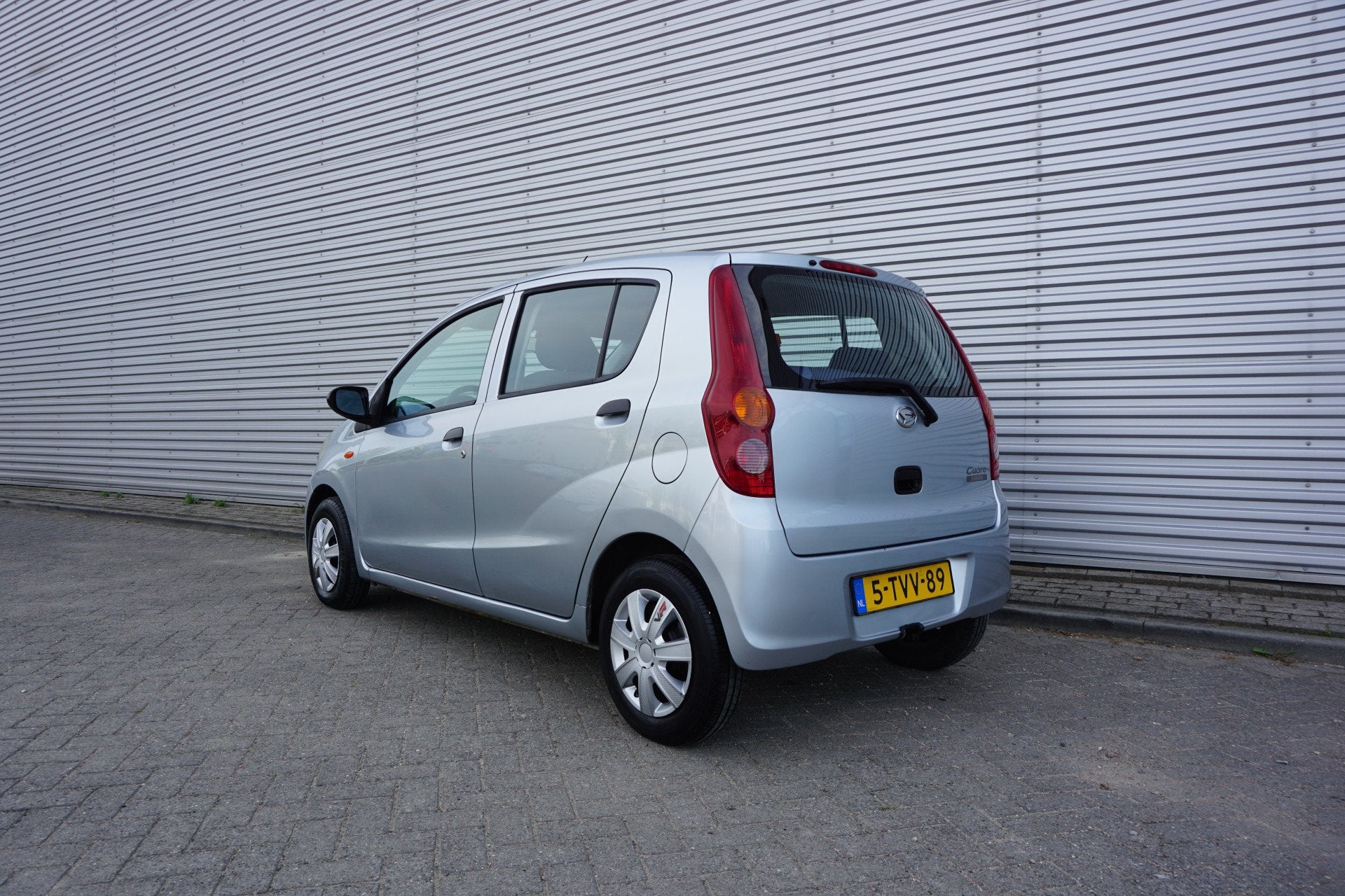 Daihatsu Cuore 1.0 Trend Airco / APK t/m 28 oktober 2027, Auto's, Voorwielaandrijving, Stof, Metallic lak, 18 €/maand