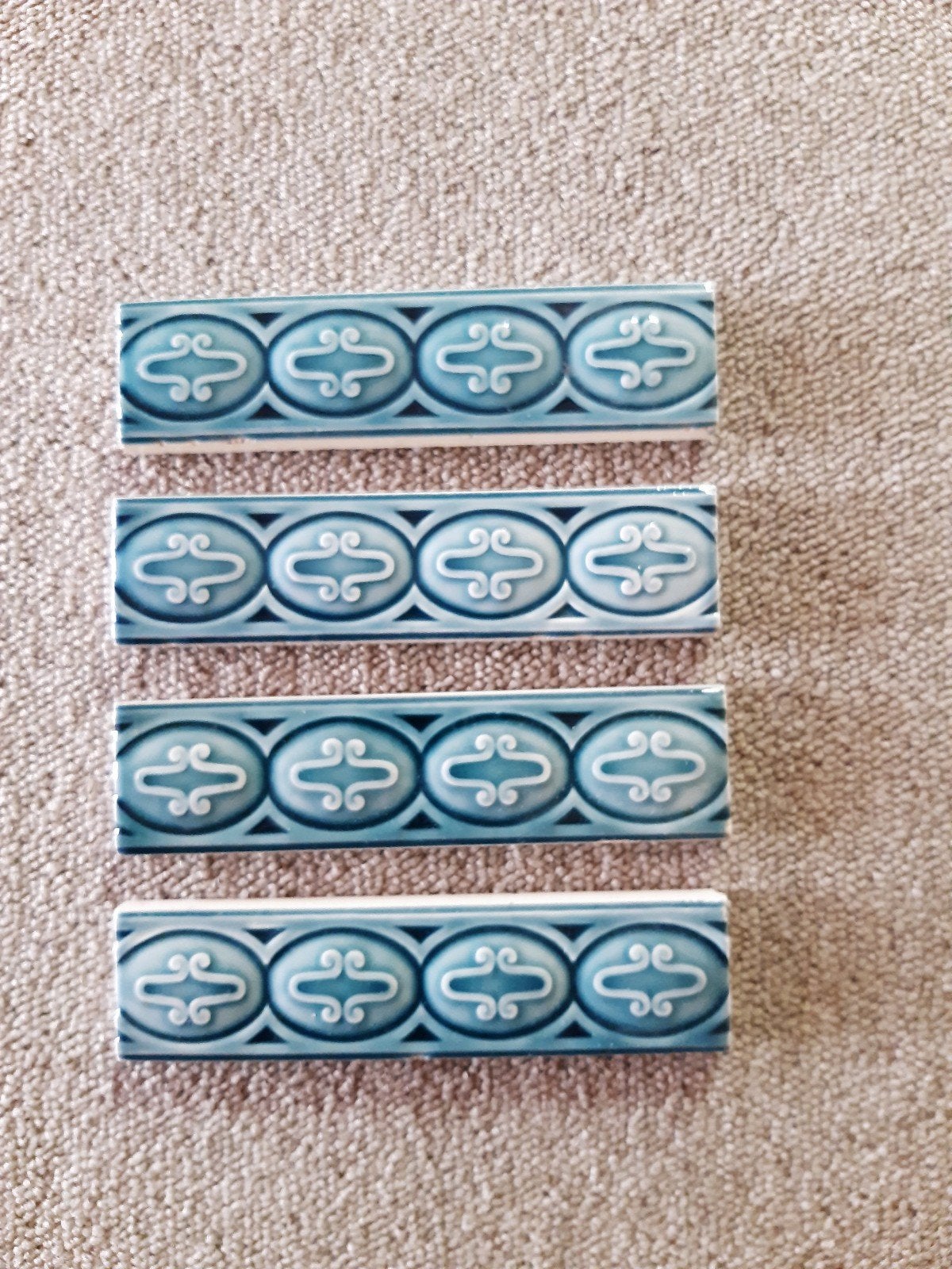 4 stuks Art Nouveau randtegels, Antiek en Kunst, Antiek | Wandborden en Tegels, Ophalen of Verzenden