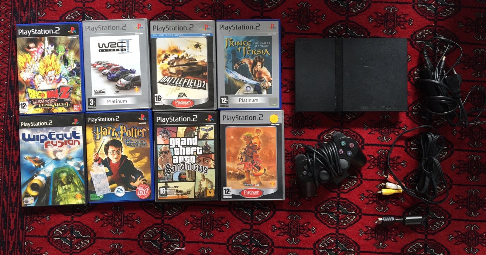 Playstation 2 slim met 8 games, Zwart, Ophalen of Verzenden, Met 1 controller, Slim