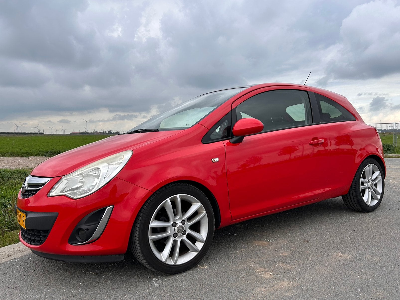 Zeer nette staat - Sportieve Opel Corsa 1.4 16V 3D 2011 Rood, Voorwielaandrijving, Stof, 40 €/maand, 4 cilinders
