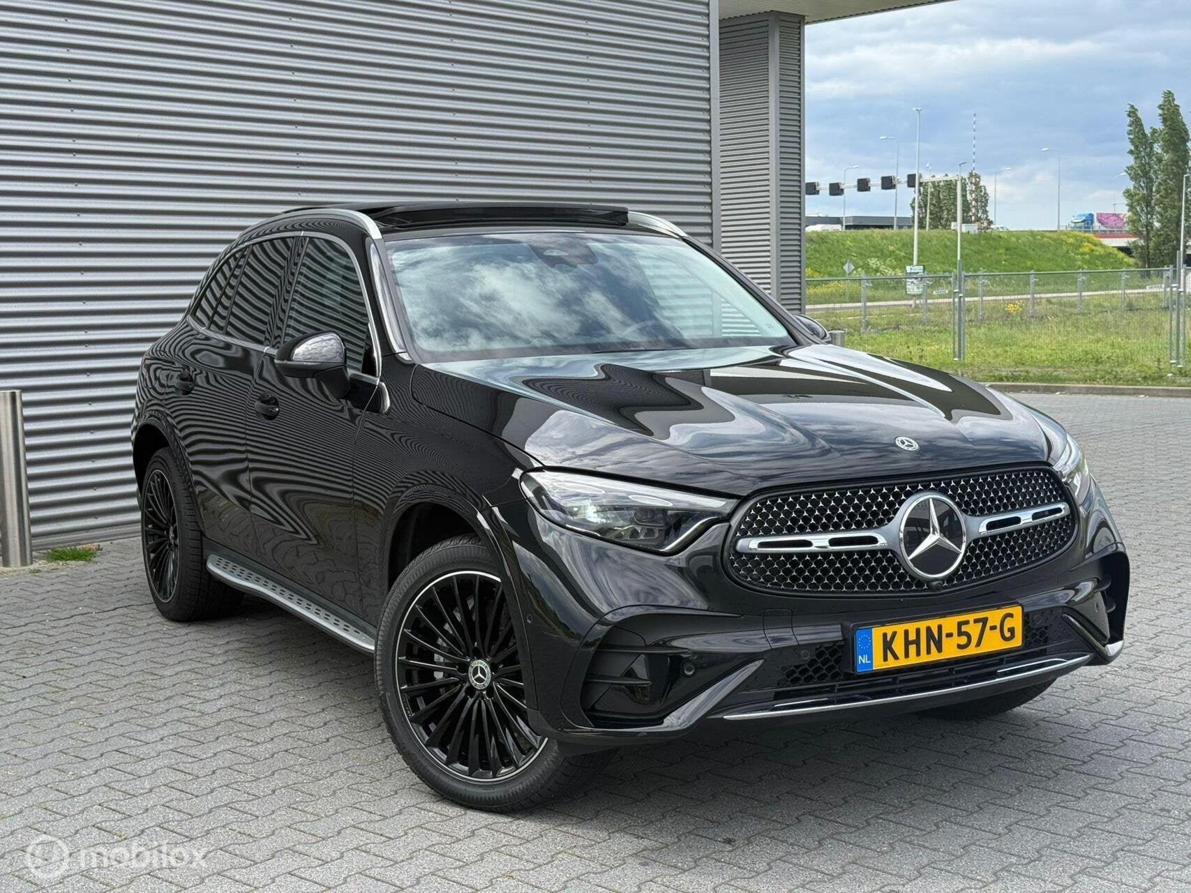 Mercedes GLC-klasse 300e 4MATIC AMG Line, Auto's, Automaat, Gebruikt, Zwart, Vierwielaandrijving