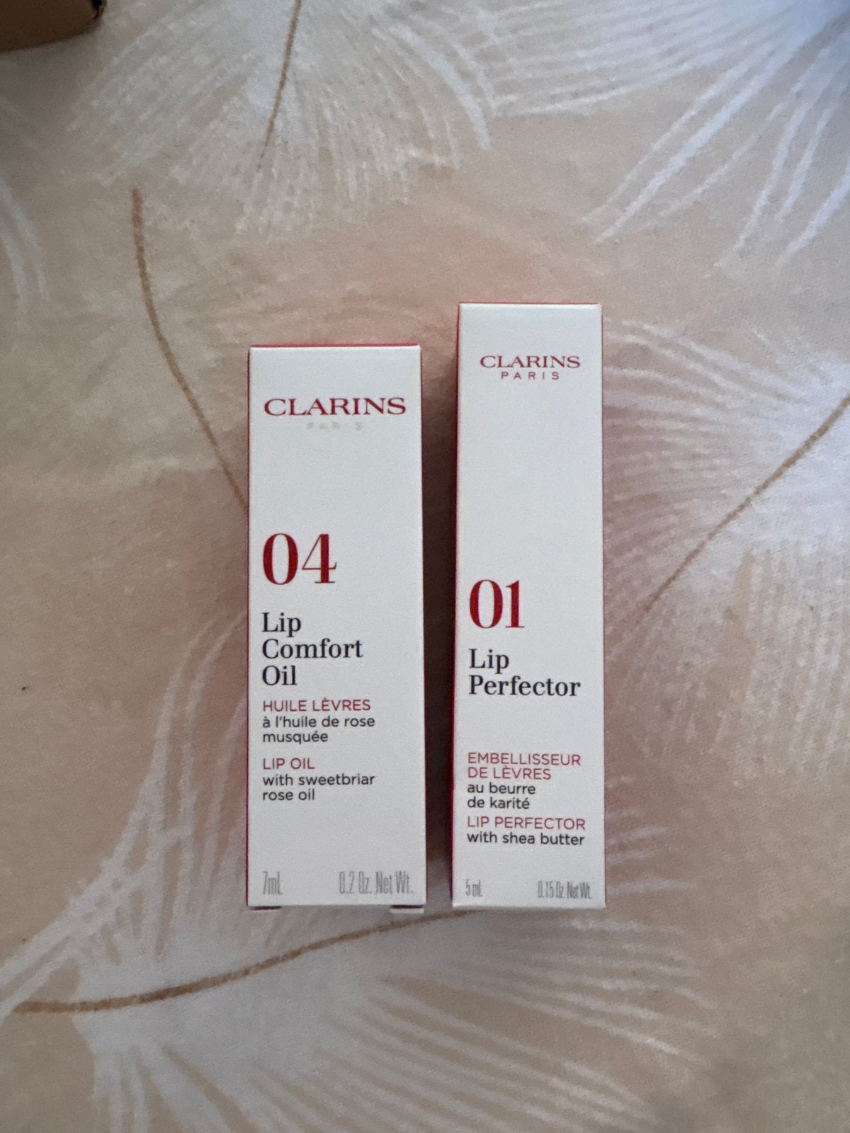 Clarins Lip Comfort Oil & Lip Perfector Set, Nieuw, Ophalen of Verzenden, Make-up, Overige kleuren
