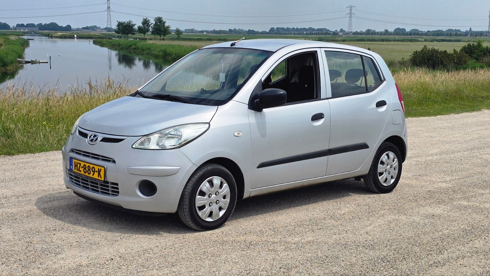 Hyundai i10 1.1 I 5DR 2009 Grijs / NAP / APK  / Airco / NAVI, Voorwielaandrijving, 31 €/maand, 4 cilinders, 400 kg