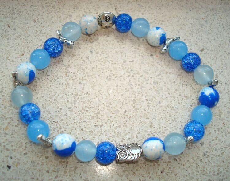 Armband van halfedelsteen in blauw met dierenkralen, Sieraden, Tassen en Uiterlijk, Armbanden, Nieuw, Elastiek, Blauw, Met bedels of kralen