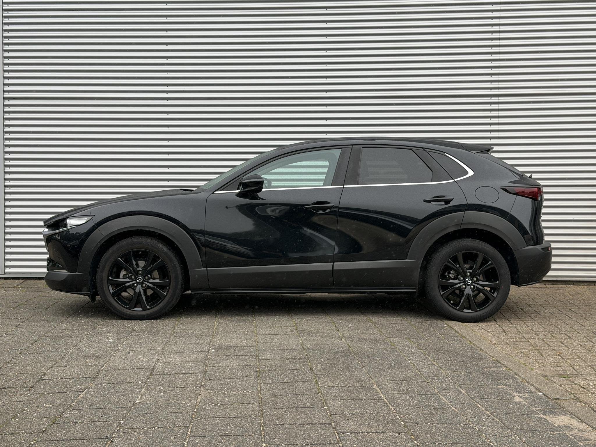 Mazda CX-30 2.0 e-SkyActiv-X M Hybrid Sportive | Bose | Came, Stof, Gebruikt, Zwart, Origineel Nederlands