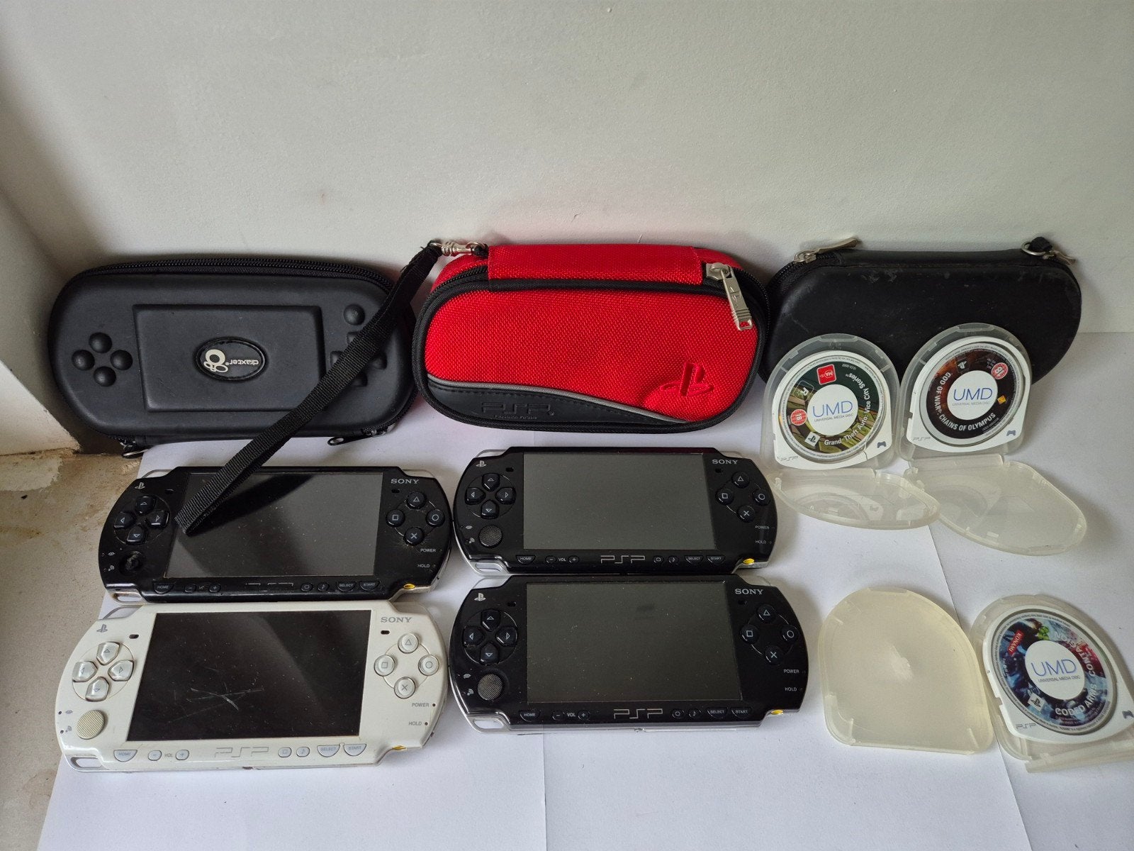Lot 4 Sony PSP-2000 - Voor onderdelen of reparatie -Compleet, Ophalen of Verzenden, Niet werkend, Overige modellen, Met games