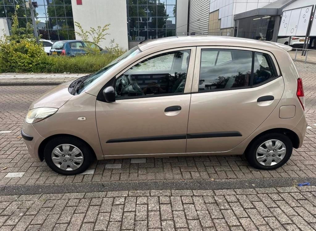 Hyundai i10 1.1 I 5DR 2009 Beige, Auto's, Voorwielaandrijving, 31 €/maand, 4 cilinders, 400 kg