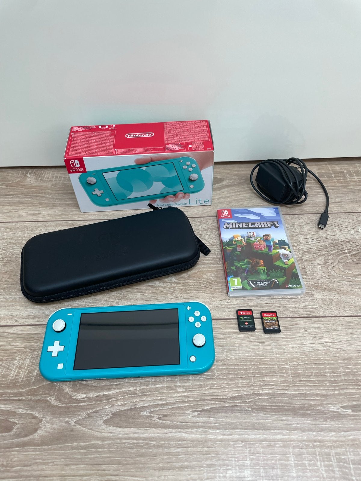 Nintendo Switch Lite Turquoise, Met games, Ophalen of Verzenden, Zo goed als nieuw, Zonder controller
