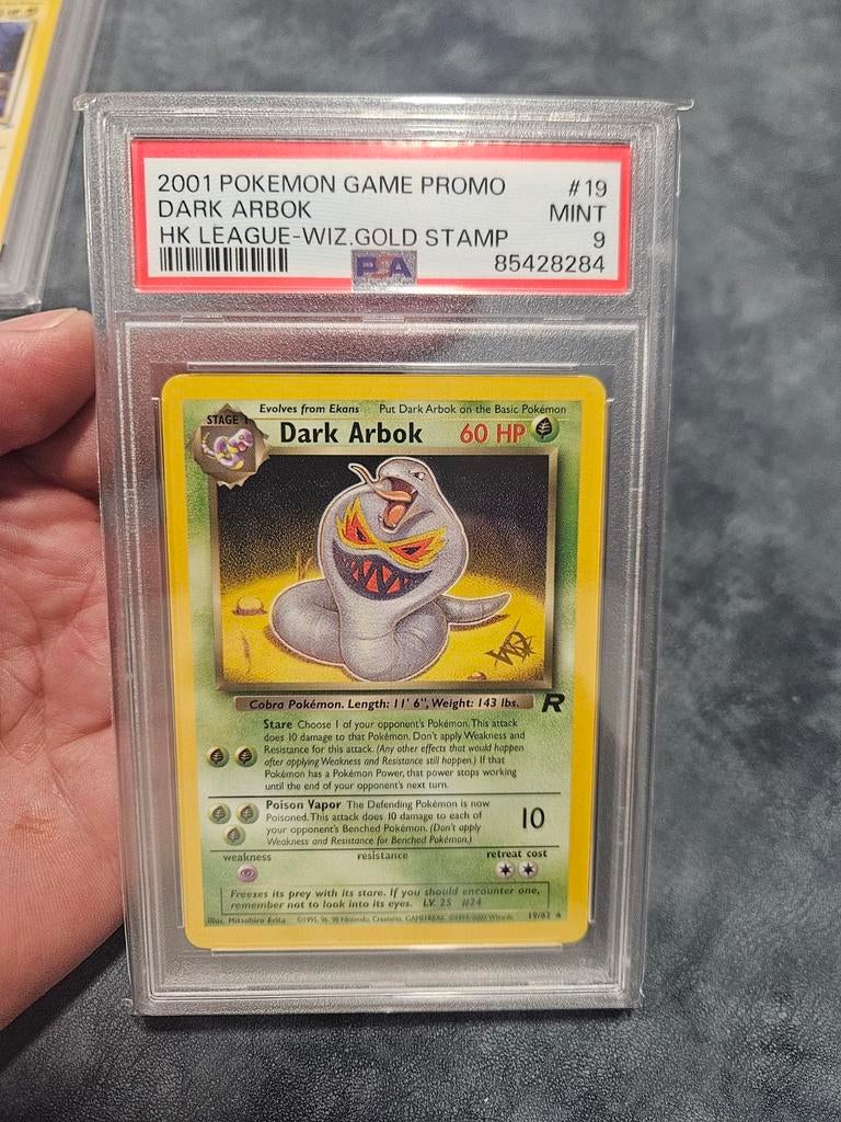 Pokémon Dark Arbok Wizards Promo PSA Gold Stamp, Ophalen of Verzenden, Zo goed als nieuw