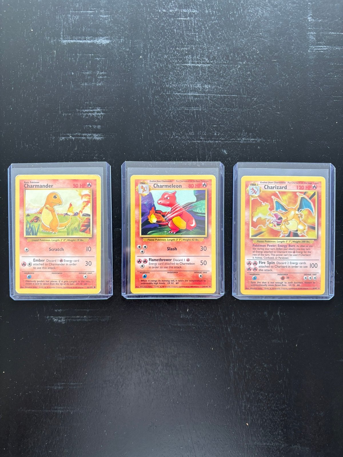 Aangeboden pokemon charizard 4/102 evolutie base, Verzamelen, Speelkaarten, Jokers en Kwartetten, Ophalen of Verzenden, Zo goed als nieuw