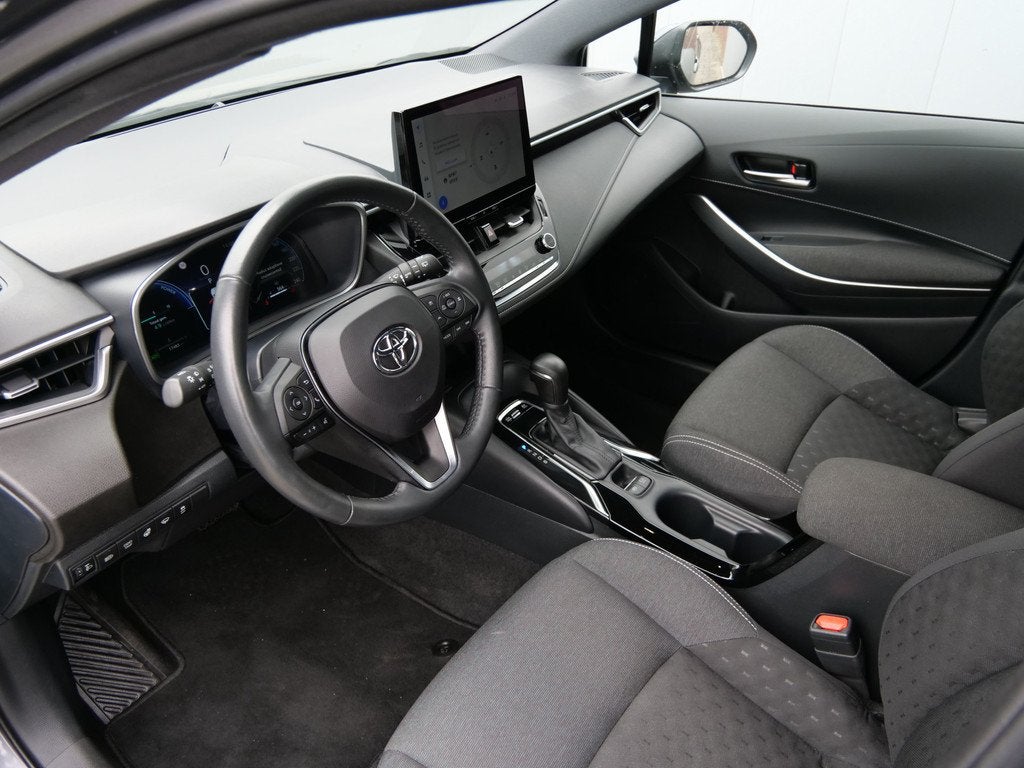 Toyota Corolla Touring Sports Hybrid 140 Pk Business Automaa, Auto's, Toyota, 4 cilinders, Corolla, Hybride Elektrisch/Benzine