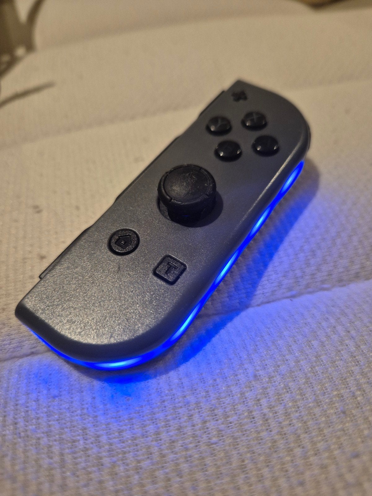 Nintendo Switch Joy-Con (links) - Grijs met blauwe LED, Ophalen of Verzenden, Gebruikt, Met 1 controller, Switch Original