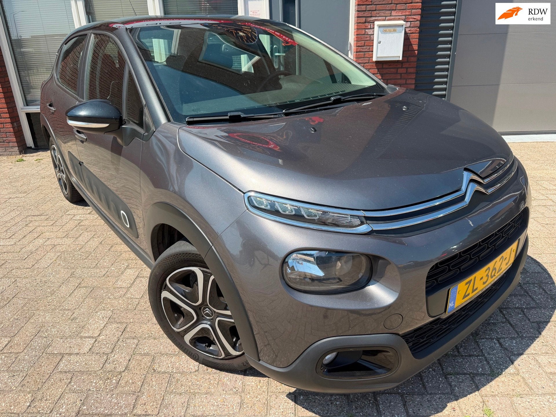 Citroen C3 1.2 PureTech Feel Edition / Navi / PDC / Carplay, Auto's, Voorwielaandrijving, 83 pk, 1199 cc, Met garantie (alle)