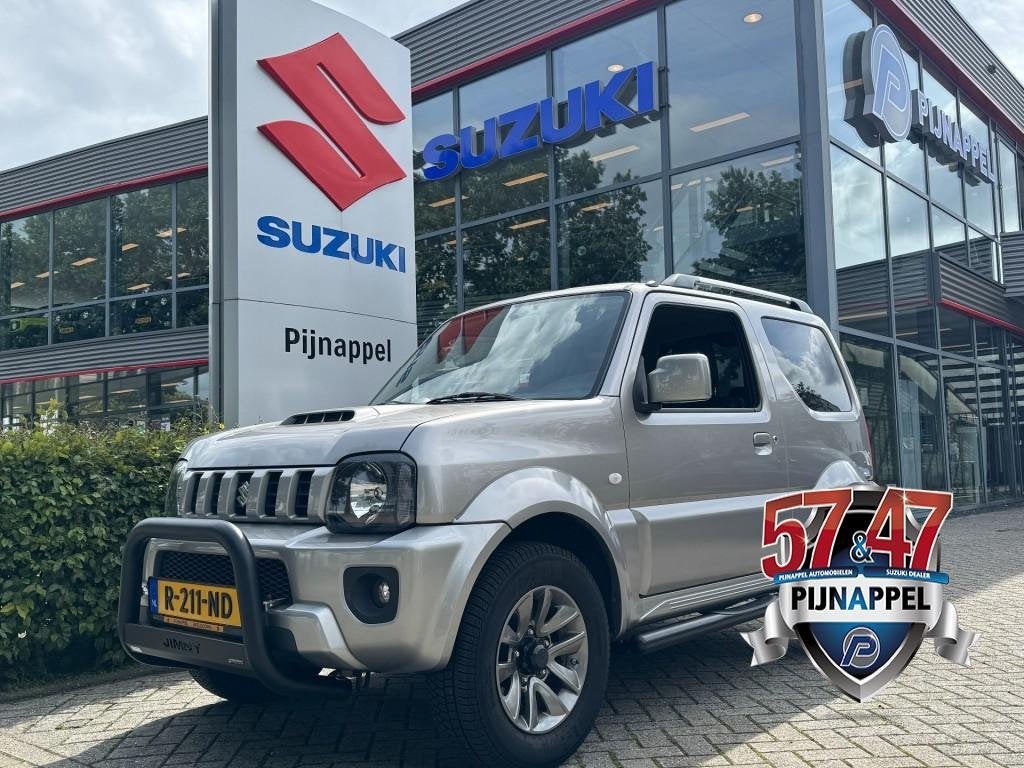 Suzuki JIMNY 1.3 Exclusive 4x4 Airco/Leder/Trekhaak/Camera a, Auto's, 86 pk, Euro 6, Met garantie (alle), 4 stoelen