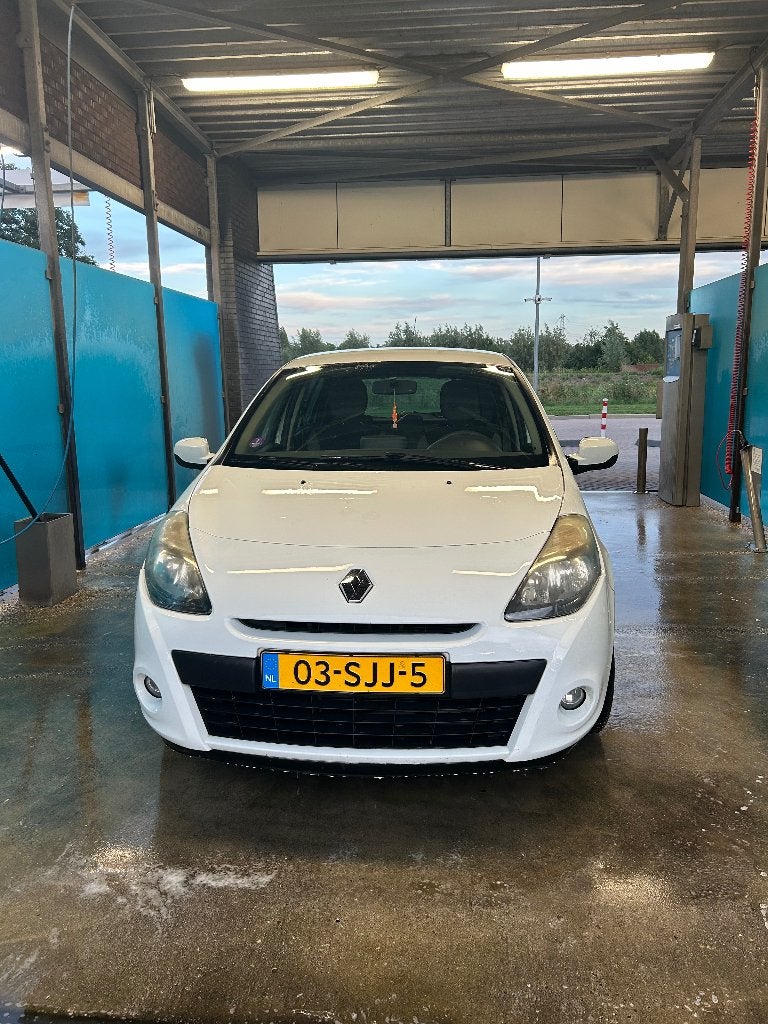 Renault Clio 1.2 16V 55KW 5-DRS E4 2011 Wit, Auto's, Voorwielaandrijving, Stof, 74 pk, Zwart