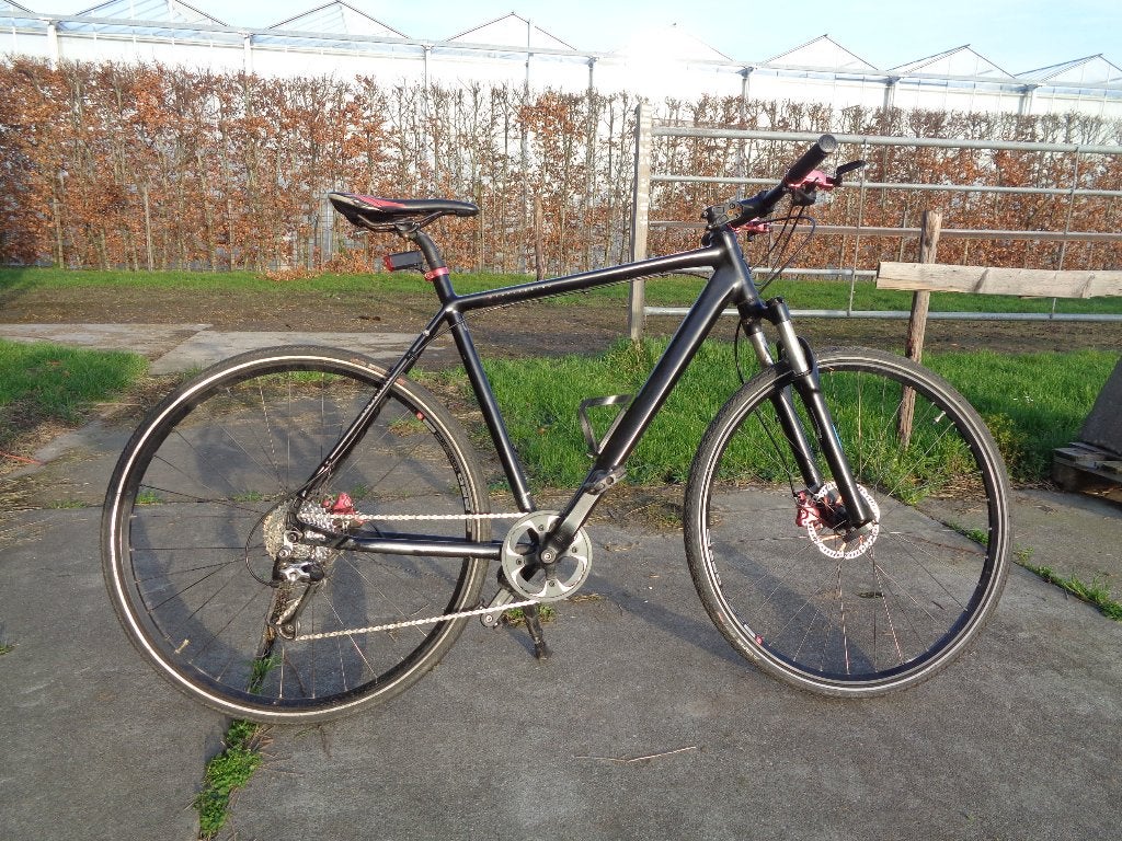 KOGA supermetro heren stads -/toerfiets -9 v./57 fr./28 inch, Gebruikt, Vering, 57 tot 61 cm, Schijfrem