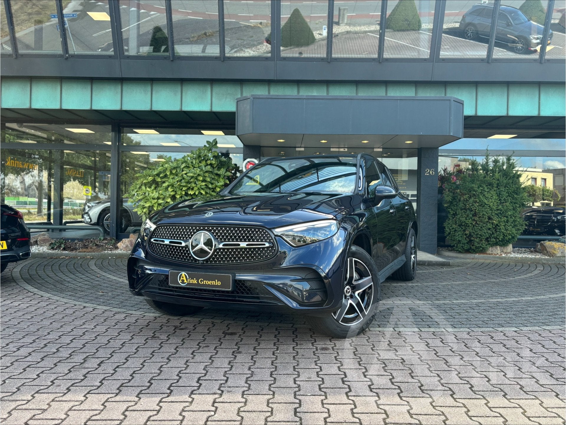 Mercedes-Benz GLC 300e 4MATIC AMG Line Panoramadak, Rijassis, Auto's, Automaat, 12 maanden, Gebruikt, Blauw