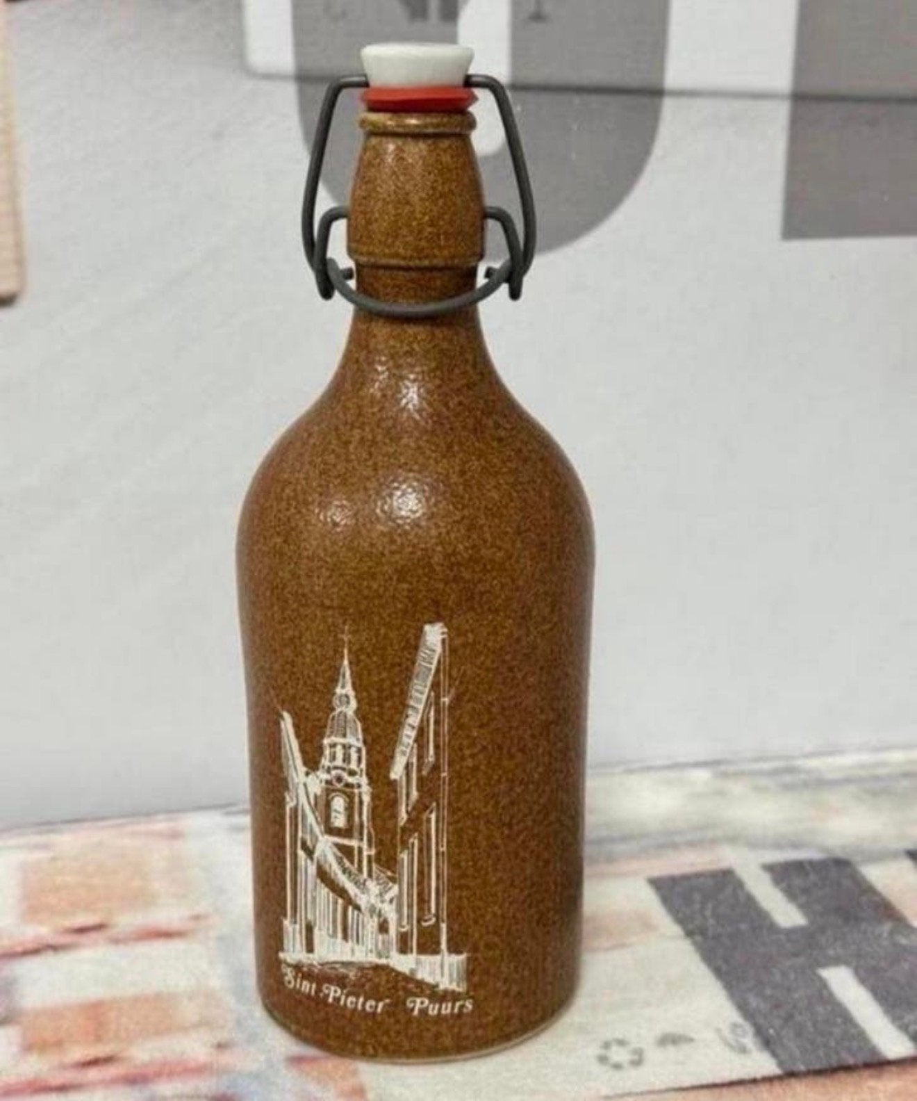 Stenen kruik beugel Sint Pieter Puurs stoneware bier fles, Ophalen of Verzenden, Zo goed als nieuw, Flesje(s), Overige merken