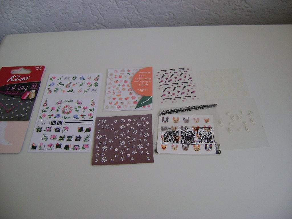 7 velletjes nagel stikkers met steentjes bloemen hondjes enz, Overige kleuren, Nieuw, Ophalen of Verzenden, Handen en Nagels