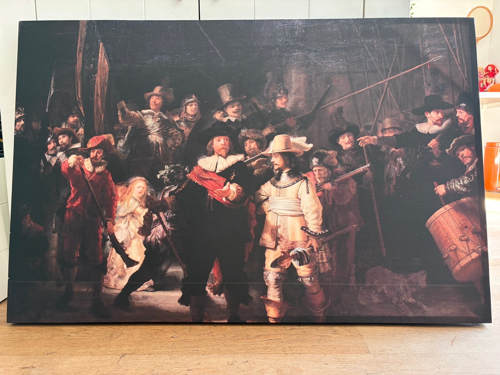 Rembrandts Nachtwacht op canvas, Ophalen