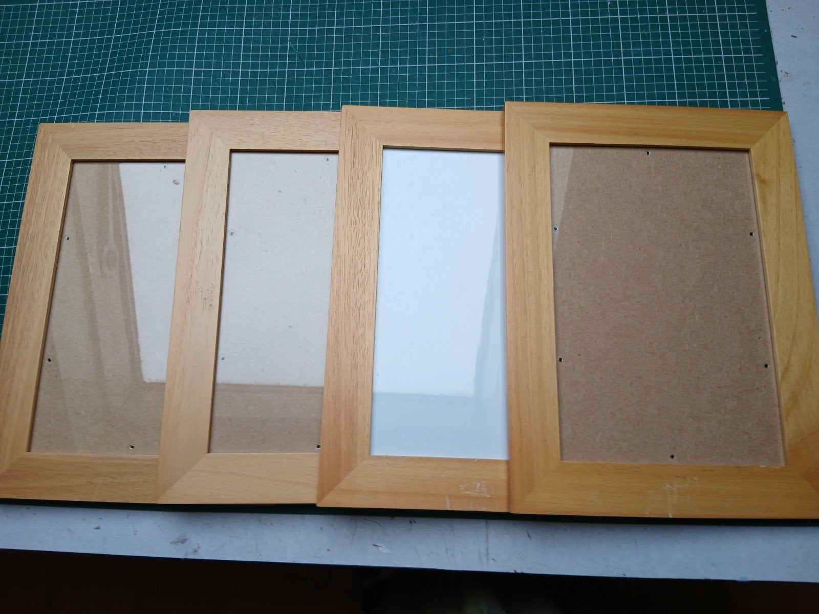 4 houten fotolijsten - binnenmaat 20x30, Audio, Tv en Foto, Fotografie | Fotolijsten, Hout, Hangend, Standaard fotolijst, Ophalen of Verzenden