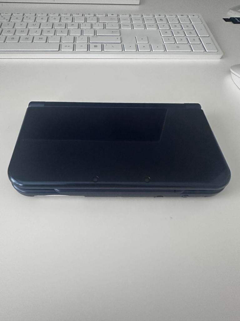Nintendo new 3DS XL - Donkerblauw - Zo goed als nieuw, Spelcomputers en Games, Spelcomputers | Nintendo 2DS en 3DS, Ophalen of Verzenden