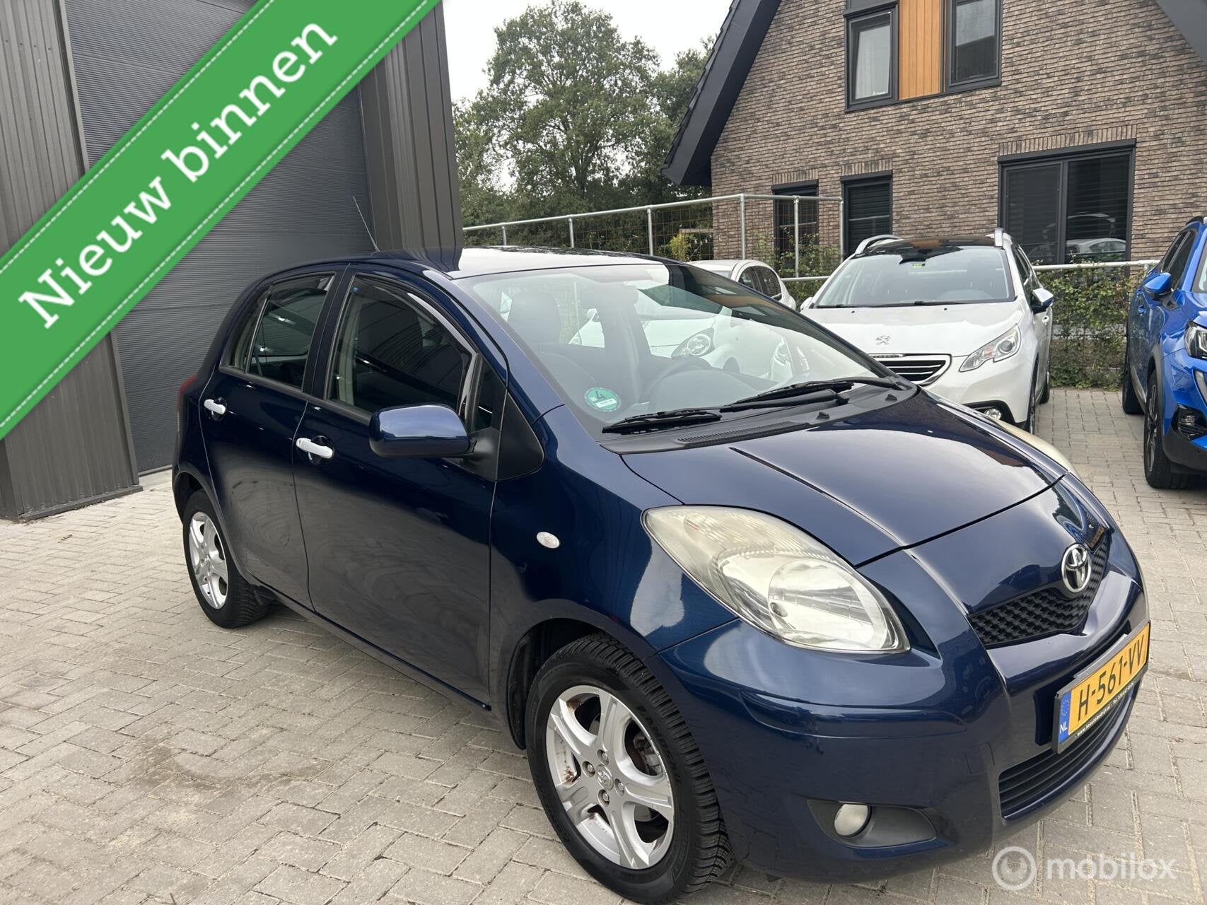 Toyota Yaris 1.3 VVTi Automaat PDC Bluetooth Trekhaak, Auto's, 101 pk, 750 kg, 4 cilinders, Blauw