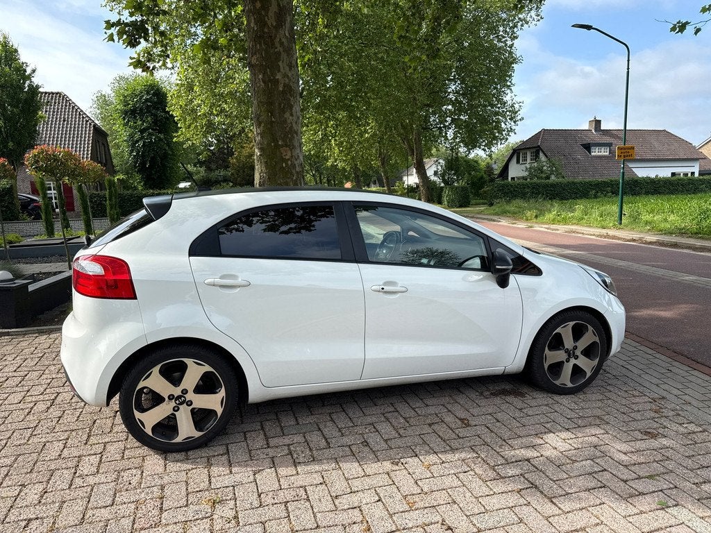 Kia Rio 1.2 CVVT Super Pack, Auto's, Euro 5, Zwart, 4 cilinders, Wit