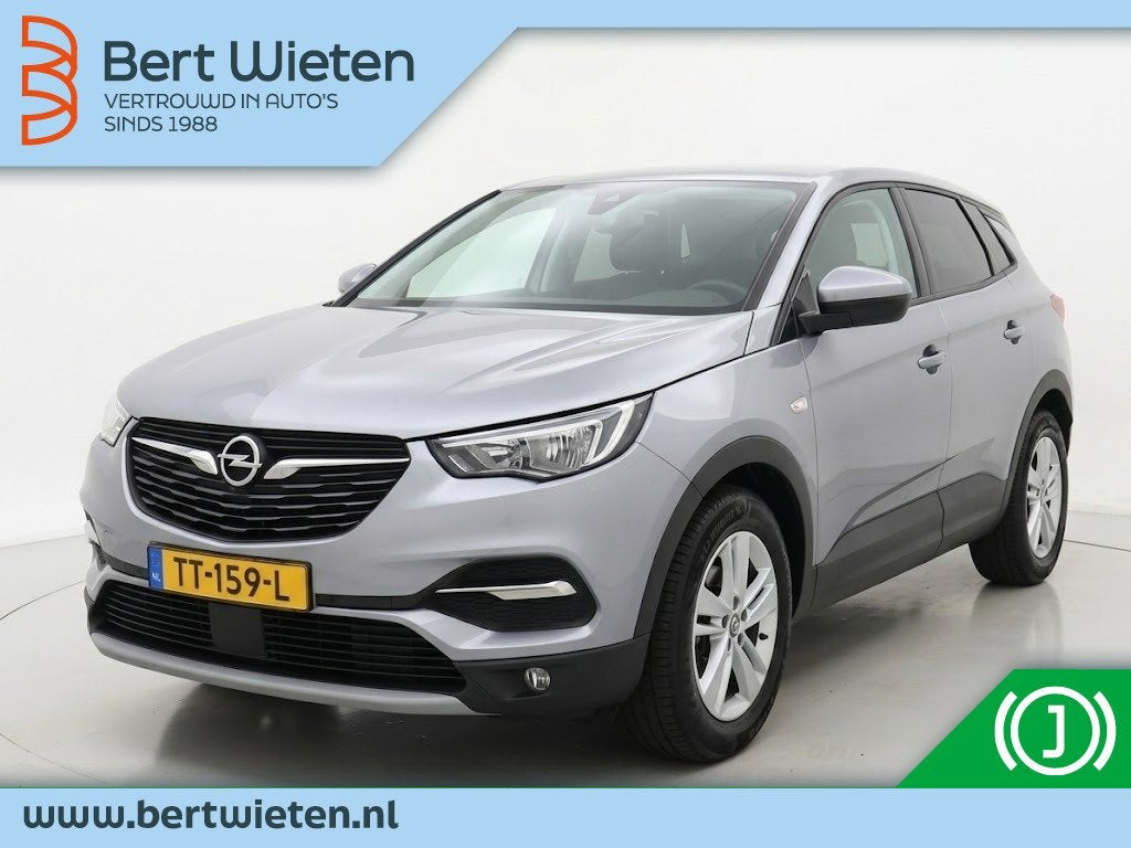 Opel Grandland X 1.2 Turbo Innovation | Trekhaak | Stoelverw, Auto's, Gebruikt, 1199 cc, Leder en Stof, 19 km/l