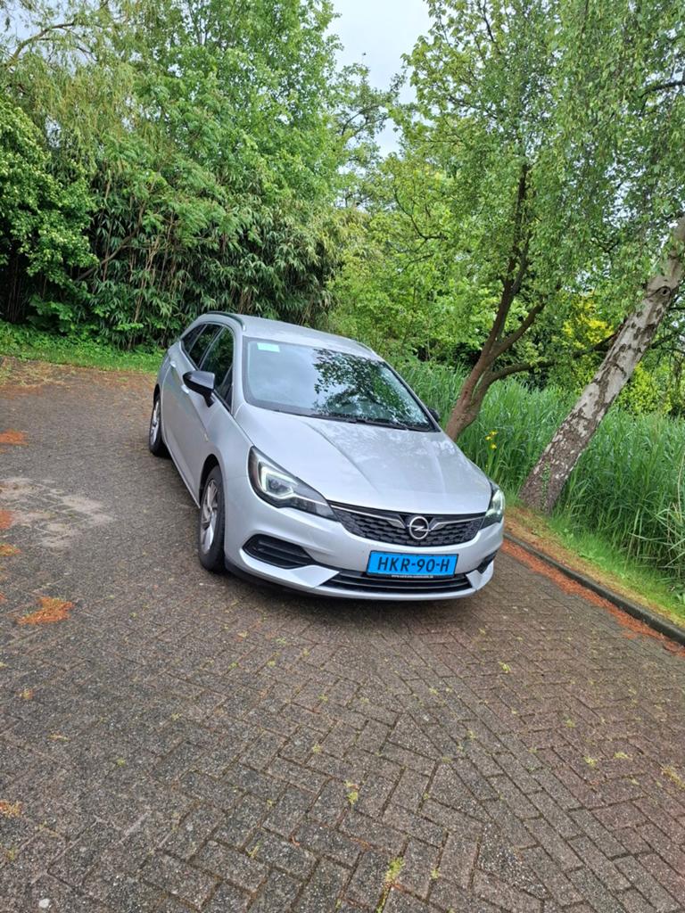 Opel Astra Sports Tourer 1.5 Diesel Automaat (2021) (Taxi), Leder en Stof, Diesel, Lane Keeping Assist, Te koop