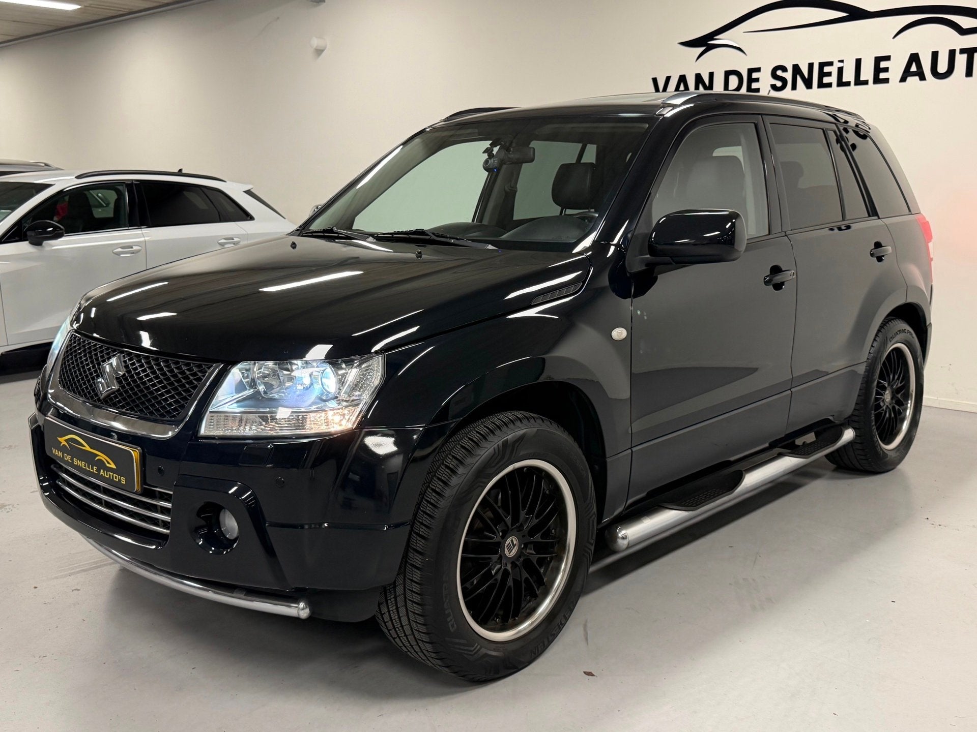 Suzuki Grand Vitara 2.0-16V High Executive AUTOMAAT/XENON/PA, Auto's, Suzuki, Automaat, 4 cilinders, Grand Vitara, Zwart