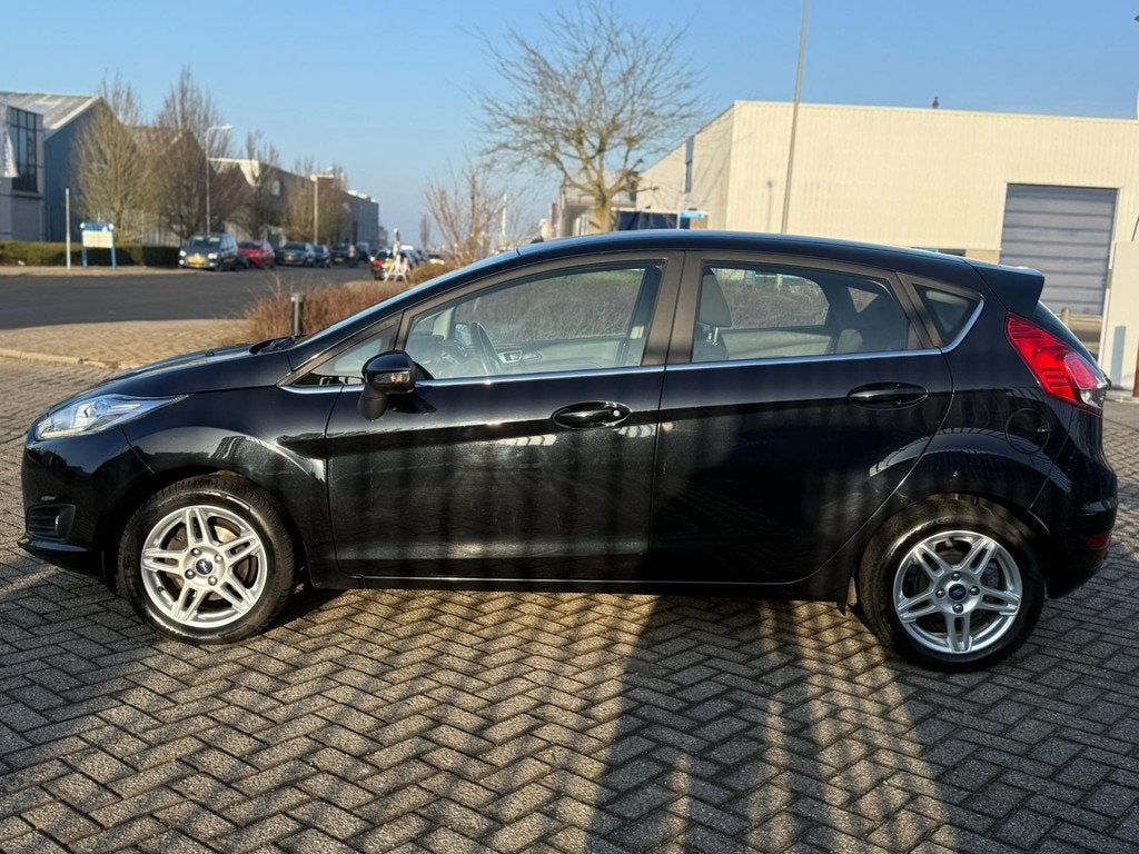 Ford Fiesta 1.0 Titanium#Nap#Airco#Navi#Cruis#PDC, Voorwielaandrijving, Euro 5, Stof, 525 kg