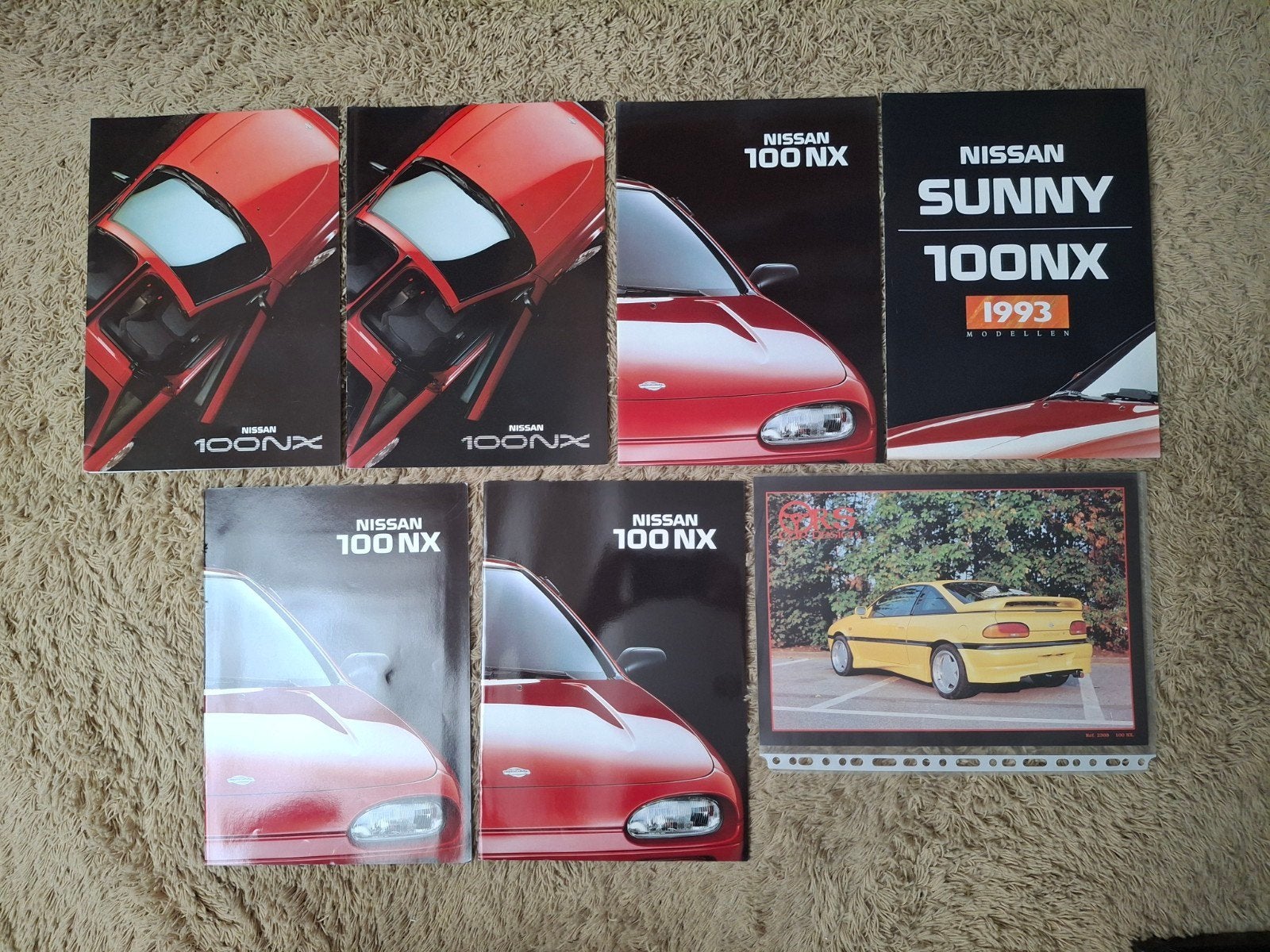 Lot autofolders Nissan 100 NX, Verzenden, Nissan