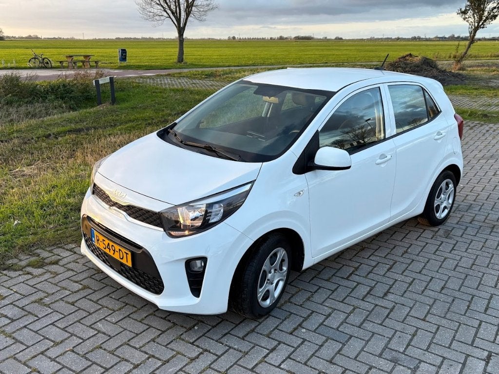 Kia Picanto met 2 jaar APK!, Stof, 4 stoelen, Wit, Origineel Nederlands