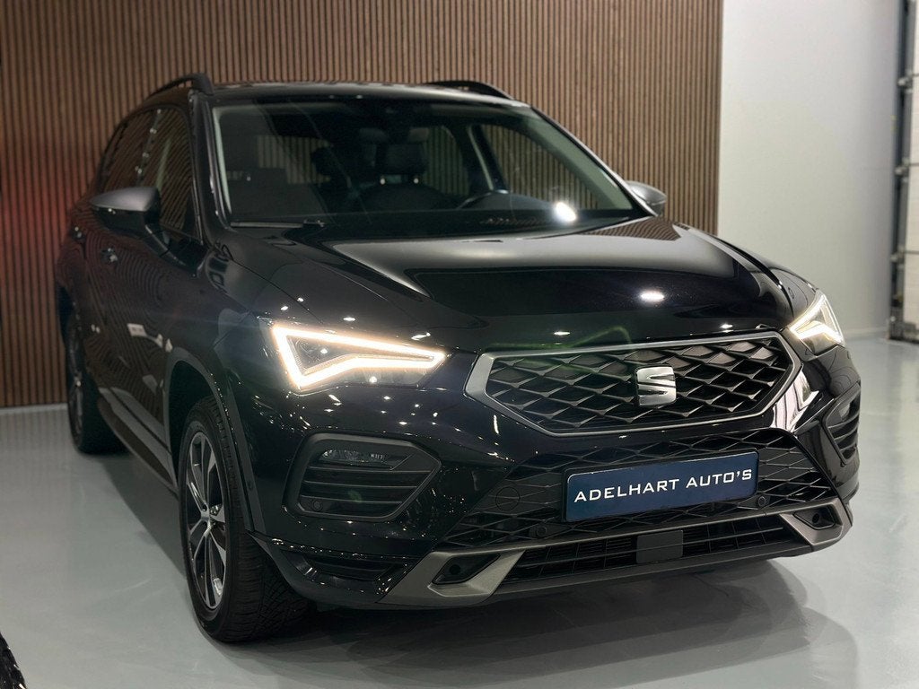 SEAT Ateca 1.5 TSI FR Business Intense Automaat /Navigatie f, Auto's, Seat, 15 km/l, Zwart, 4 cilinders, 150 pk
