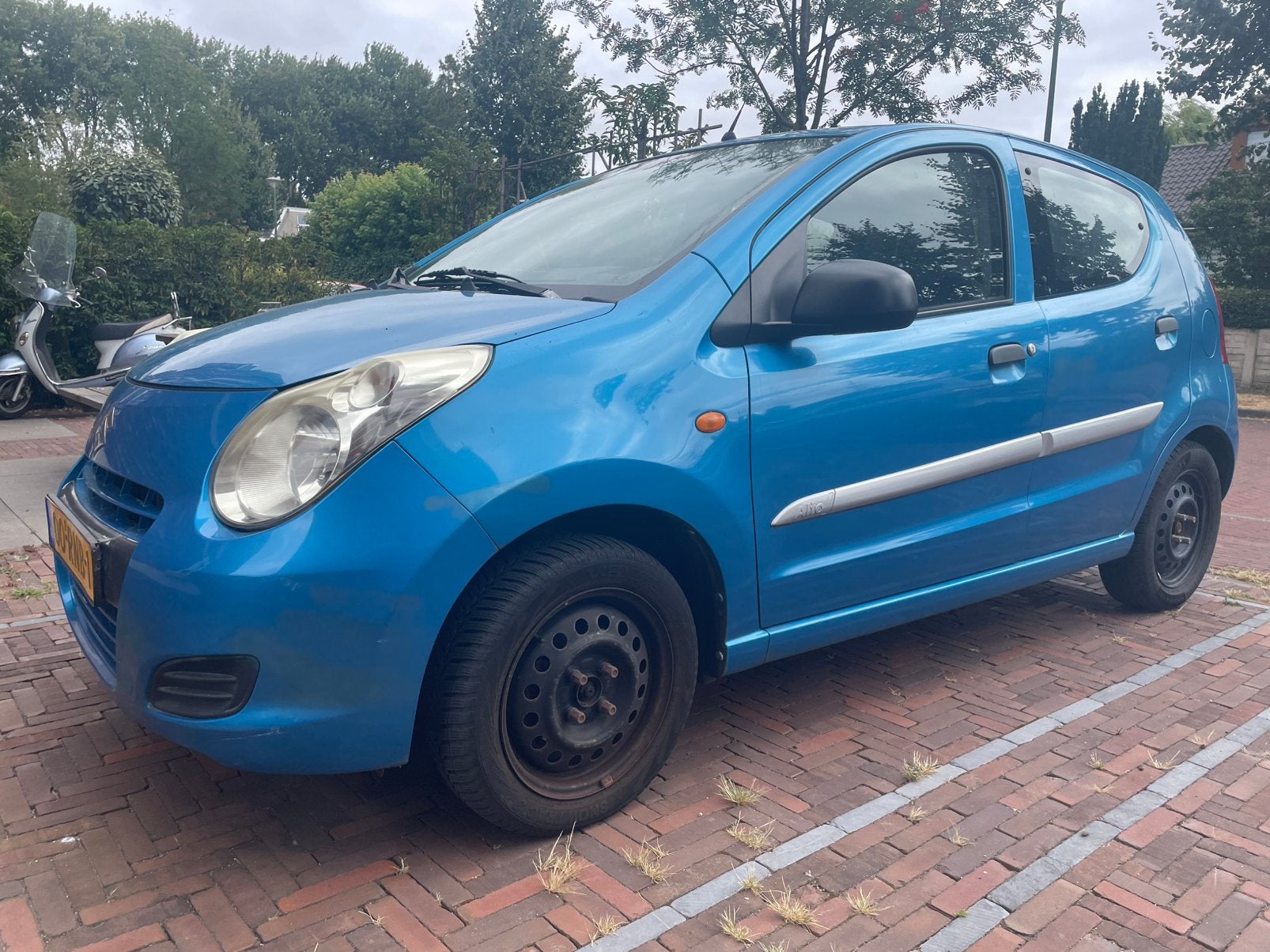 Suzuki Alto 1.0 2011 Blauw, Auto's, Voorwielaandrijving, 200 kg, Origineel Nederlands, Handgeschakeld