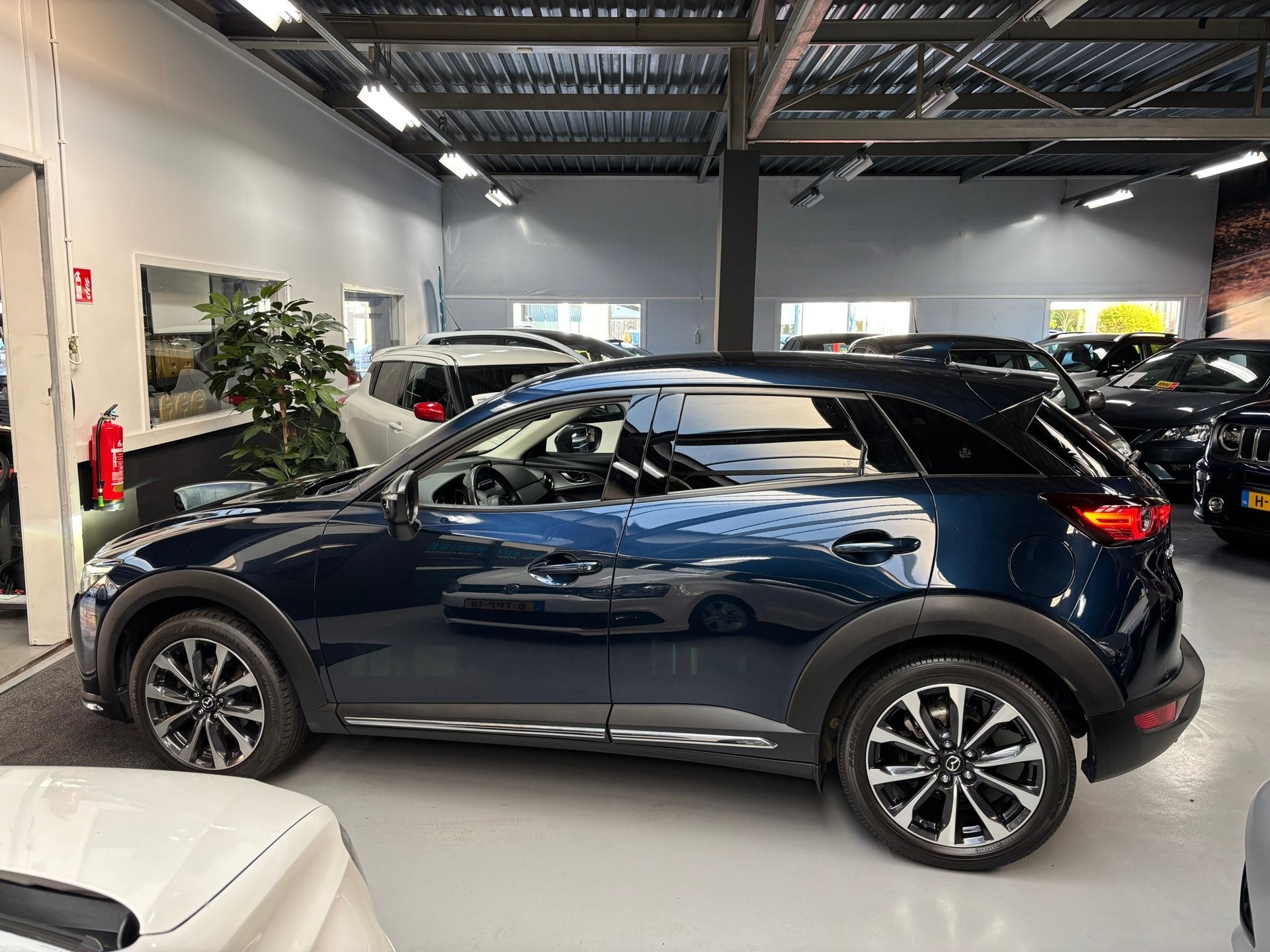 Mazda CX-3 2.0 SkyActiv-G 121 Luxury / Camera / Navigatie, 1998 cc, Gebruikt, 4 cilinders, Met garantie (alle)