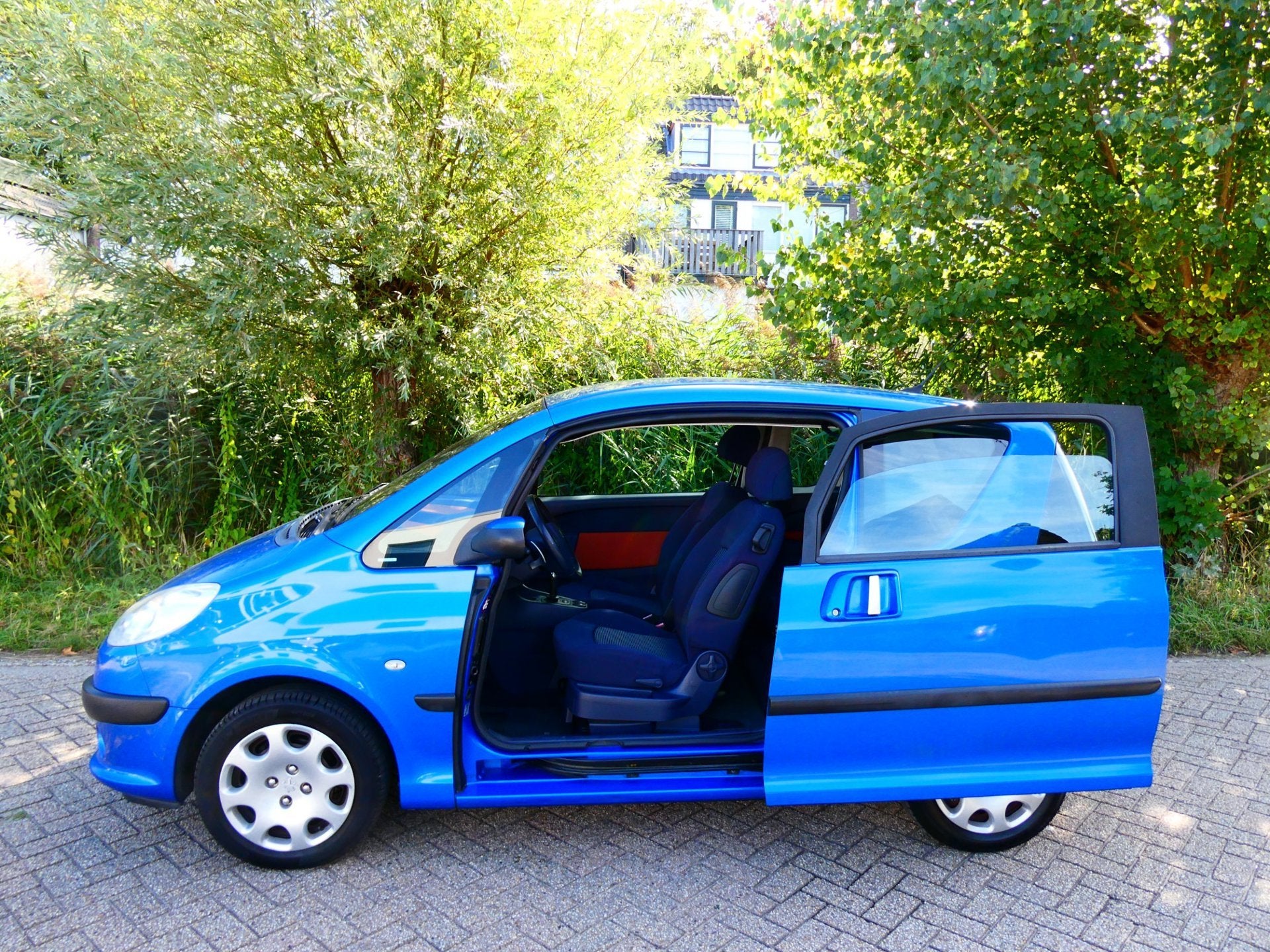 Peugeot 1007 1.6-16V 110pk Gentry Automaat 2e eig. Clima Tre, Auto's, Gebruikt, 4 cilinders, Bedrijf, Grijs