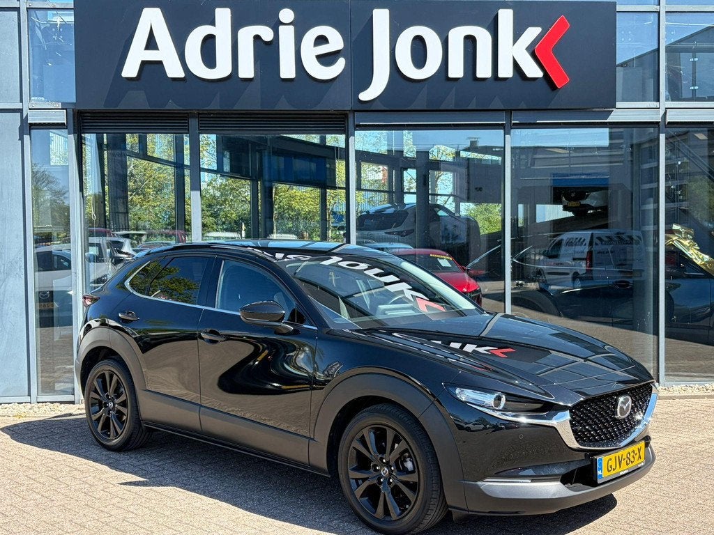 Mazda CX-30 2.0 e-SkyActiv-X M Hybrid Homura AUTOMAAT | EL.A, Auto's, Mazda, 1998 cc, Stof, Zwart, Origineel Nederlands